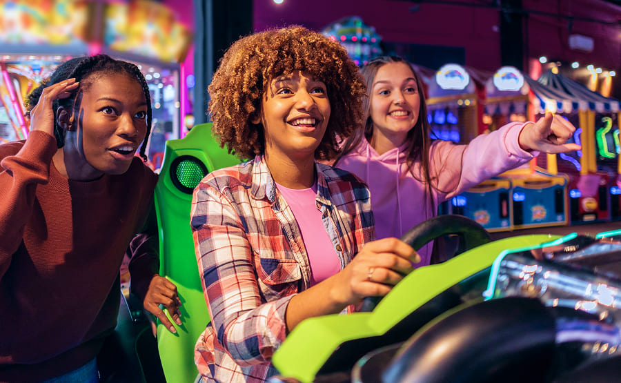 Kids Playing Arcade Games